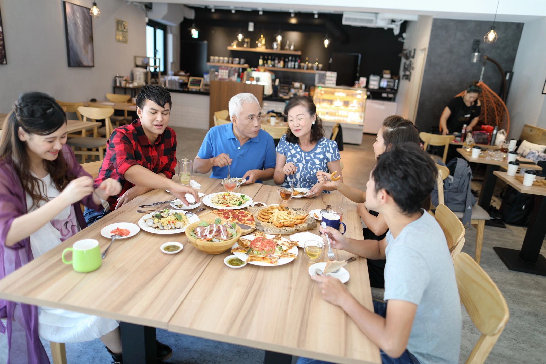 Happy extended family at Italian restaurant